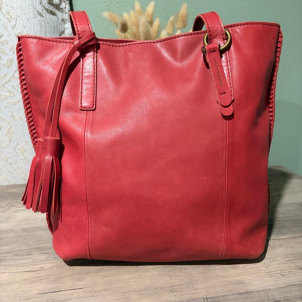 Lucky Brand Leather Tote bag with tassel detail.